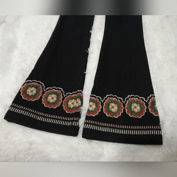 Black pull-on flare pants with embroidered hem - Picture 12 of 13